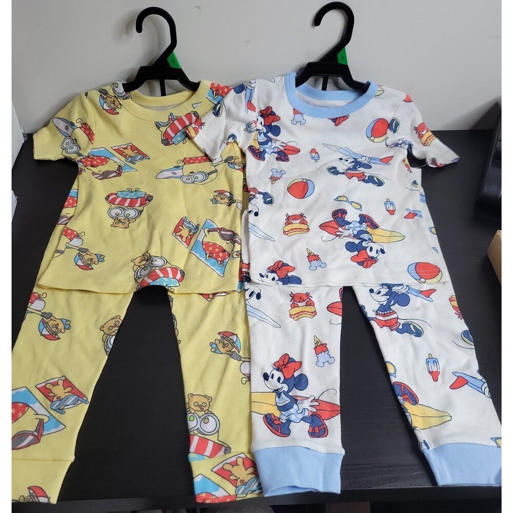 2 sets of size 5T character pajamas